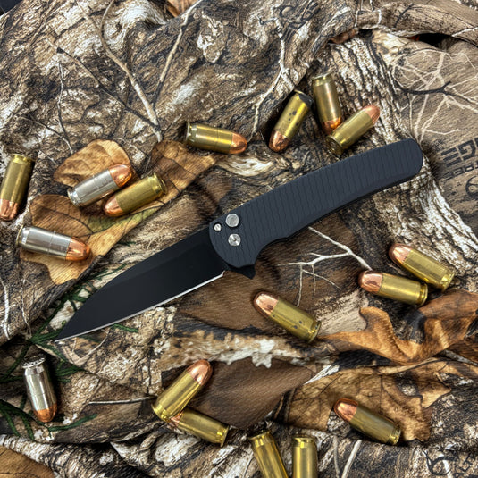 Protech 5336-LTD Malibu Flipper, black dragon scale textured handles, DLC black Magnacut Wharncliffe Blade, black lip pearl button, satin hardware, black clip, knife