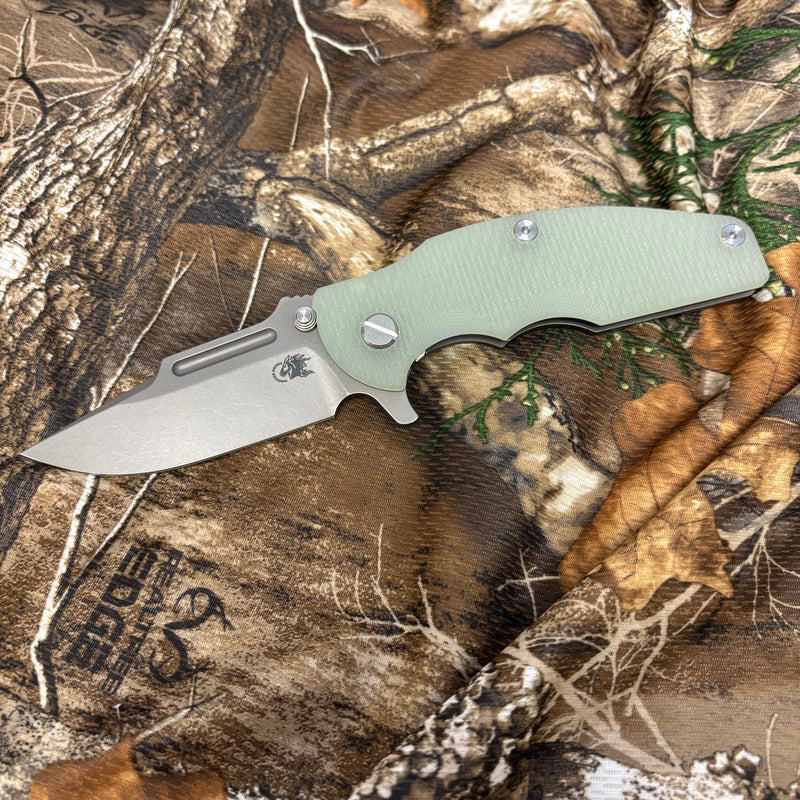 Load image into Gallery viewer, Rick Hinderer Jurassic Frontier 3.375" Magnacut Clip Point, Tri-Way, Working Finish, Translucent Green G10 Knife
