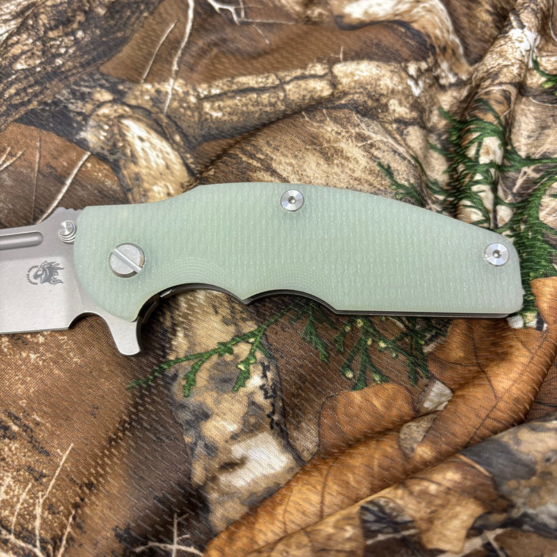 Load image into Gallery viewer, Rick Hinderer Jurassic Frontier 3.375" Magnacut Clip Point, Tri-Way, Working Finish, Translucent Green G10 Knife
