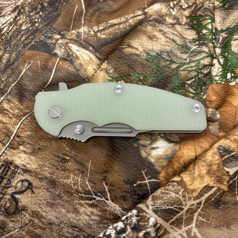 Load image into Gallery viewer, Rick Hinderer Jurassic Frontier 3.375" Magnacut Clip Point, Tri-Way, Working Finish, Translucent Green G10 Knife
