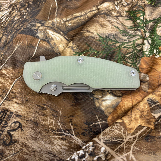 Rick Hinderer Jurassic Frontier 3.375" Magnacut Clip Point, Tri-Way, Working Finish, Translucent Green G10 Knife
