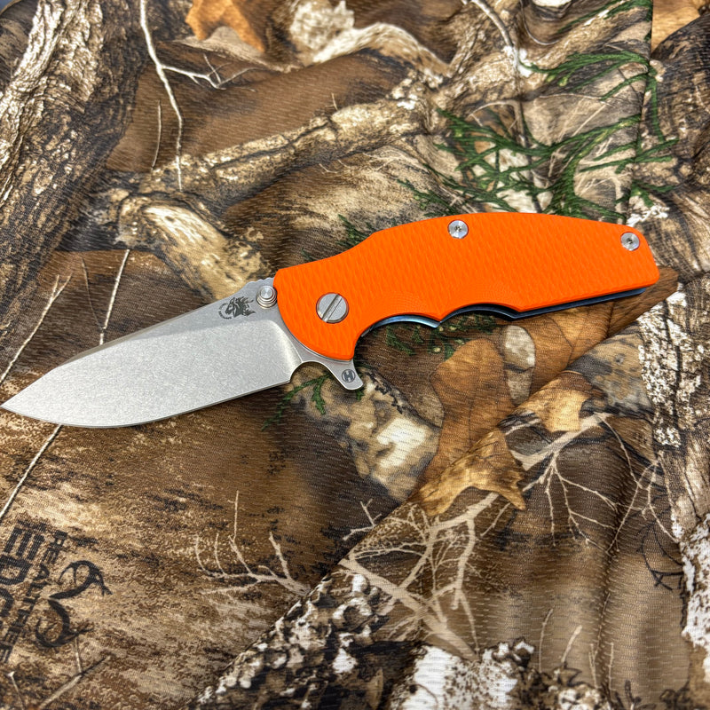 Load image into Gallery viewer, Rick Hinderer Jurassic 3.375" Magnacut Slicer, Hollow Grind, Tri-Way, Stonewash Blue, Orange G10 Knife
