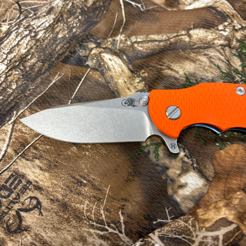 Load image into Gallery viewer, Rick Hinderer Jurassic 3.375" Magnacut Slicer, Hollow Grind, Tri-Way, Stonewash Blue, Orange G10 Knife
