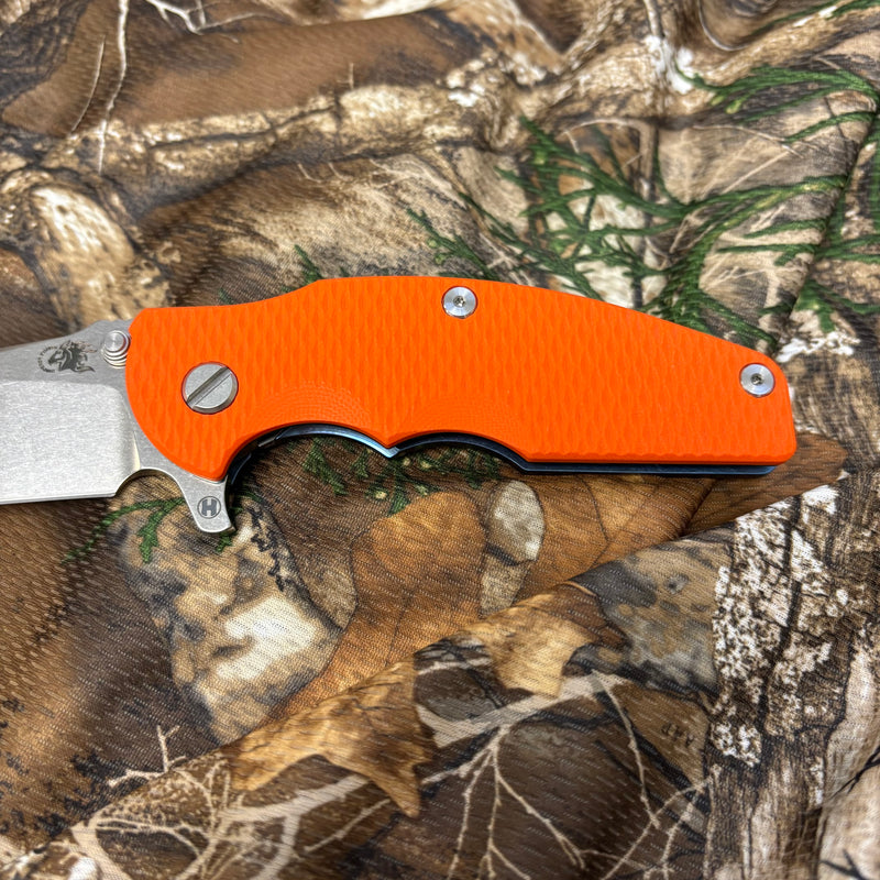Load image into Gallery viewer, Rick Hinderer Jurassic 3.375" Magnacut Slicer, Hollow Grind, Tri-Way, Stonewash Blue, Orange G10 Knife
