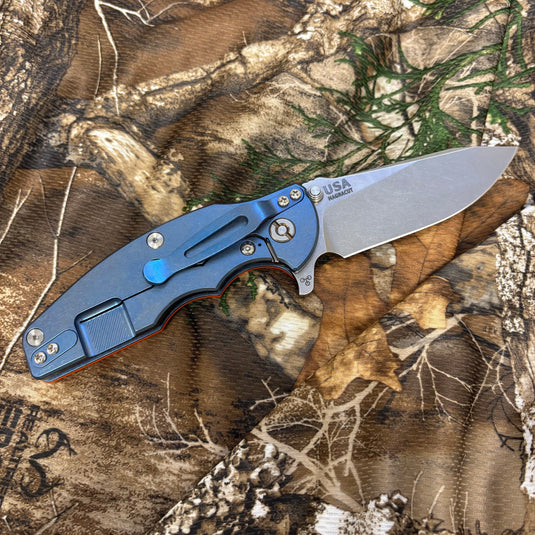 Rick Hinderer Jurassic 3.375" Magnacut Slicer, Hollow Grind, Tri-Way, Stonewash Blue, Orange G10 Knife