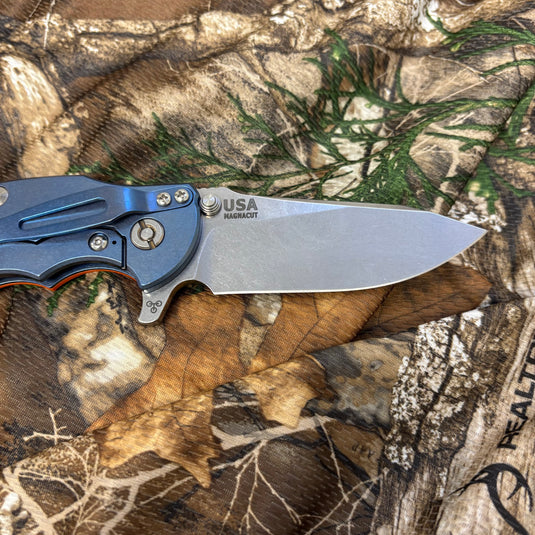 Rick Hinderer Jurassic 3.375" Magnacut Slicer, Hollow Grind, Tri-Way, Stonewash Blue, Orange G10 Knife