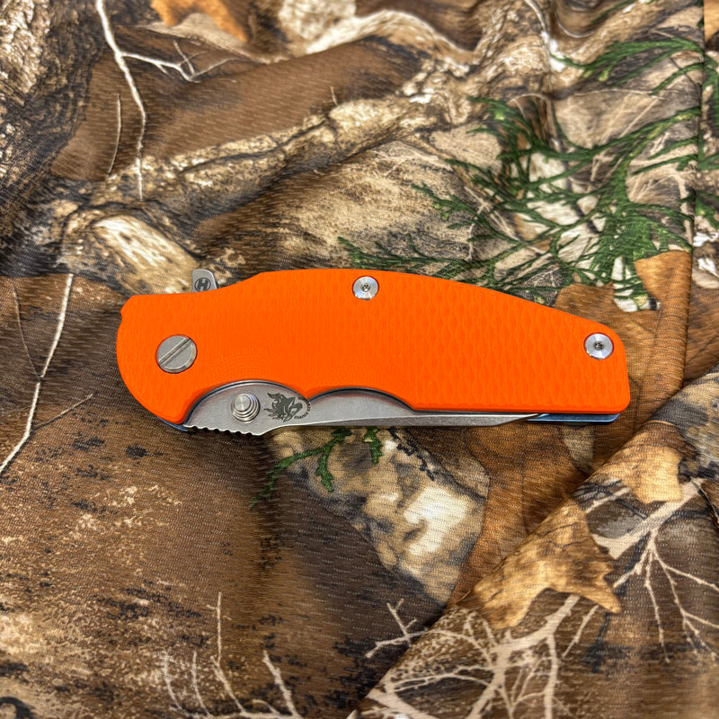 Load image into Gallery viewer, Rick Hinderer Jurassic 3.375" Magnacut Slicer, Hollow Grind, Tri-Way, Stonewash Blue, Orange G10 Knife
