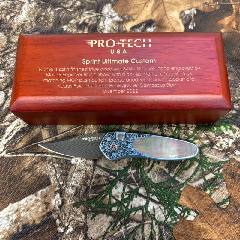 Load image into Gallery viewer, Protech 2022 Sprint Custom 002 2" Blue Anodized Titanium Frame Engraved by Bruce Shaw, Vegas Forge Damascus Blade, Pearl Button, Pearl Inlay, Titanium Clip Automatic Knife
