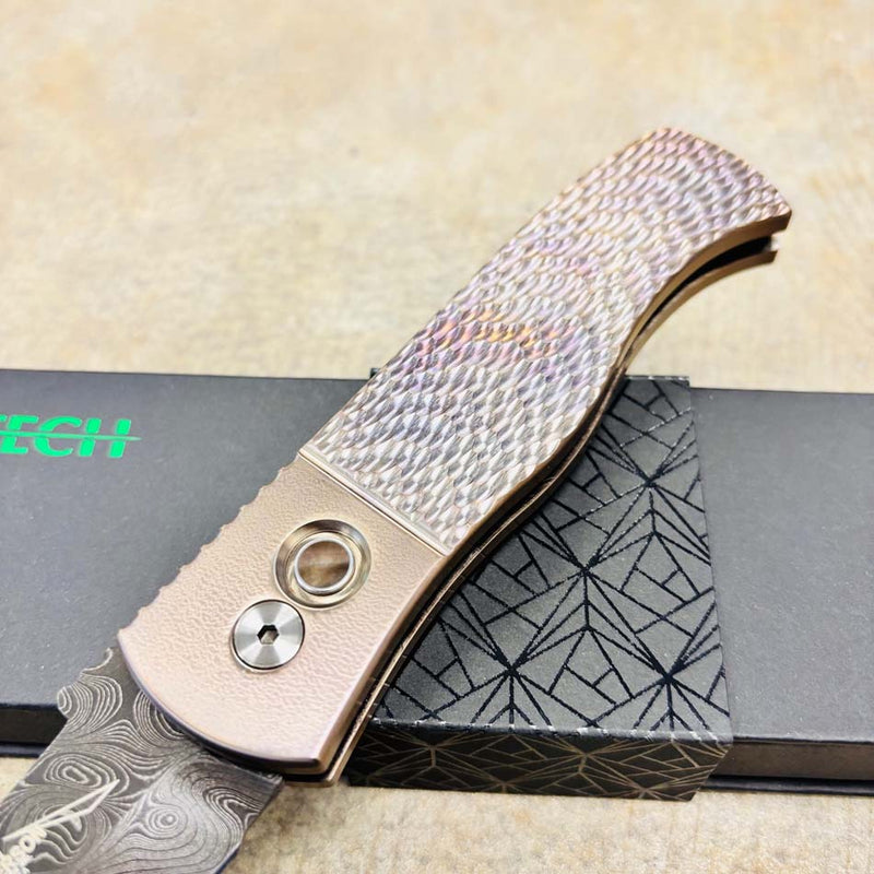 Load image into Gallery viewer, Protech 2025 Emerson Custom 002 CQC7 3.25" Jigged Titanium Handles with Burnt Bronze Ano, Black Lip Pearl Button, Nichols Damascus Chisel Tanto Blade Knife
