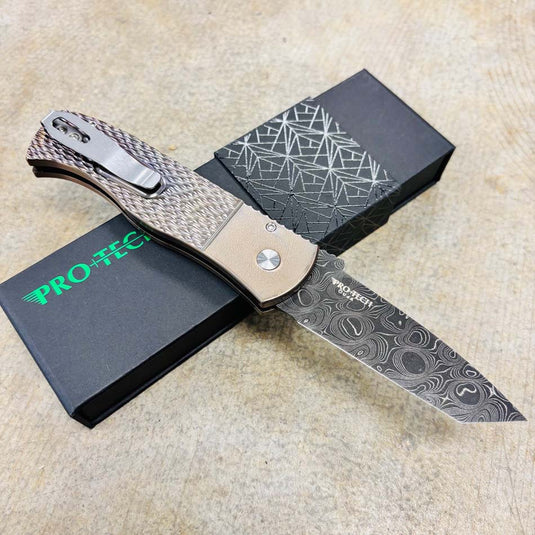 Protech 2025 Emerson Custom 002 CQC7 3.25" Jigged Titanium Handles with Burnt Bronze Ano, Black Lip Pearl Button, Nichols Damascus Chisel Tanto Blade Knife
