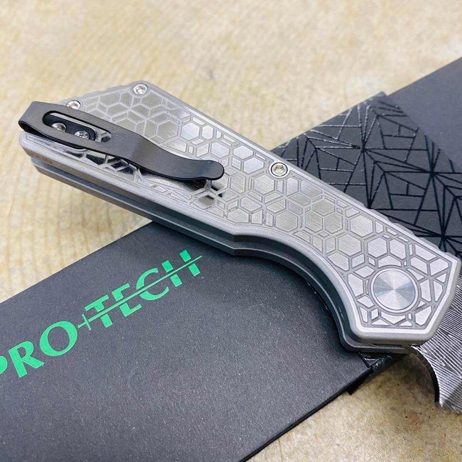 ProTech 2023 Strider PT+ Custom 003 17-4 Stainless Steel with Gridlock Pattern Handles, Satin Hardware, Black Lip Pearl Button, Mike Irie Ground Vegas Forge Herringbone Blade, Automatic Knife BLADE SHOW 2023 - Protech 2023 PT+ Custom 003 Knife