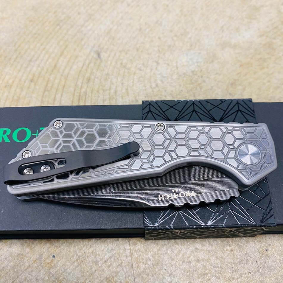 ProTech 2023 Strider PT+ Custom 003 17-4 Stainless Steel with Gridlock Pattern Handles, Satin Hardware, Black Lip Pearl Button, Mike Irie Ground Vegas Forge Herringbone Blade, Automatic Knife BLADE SHOW 2023 - Protech 2023 PT+ Custom 003 Knife